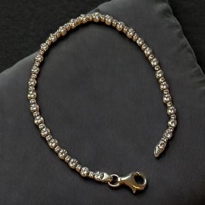 14K GOLD & DIAMOND TENNIS BRACELET- 7” Length